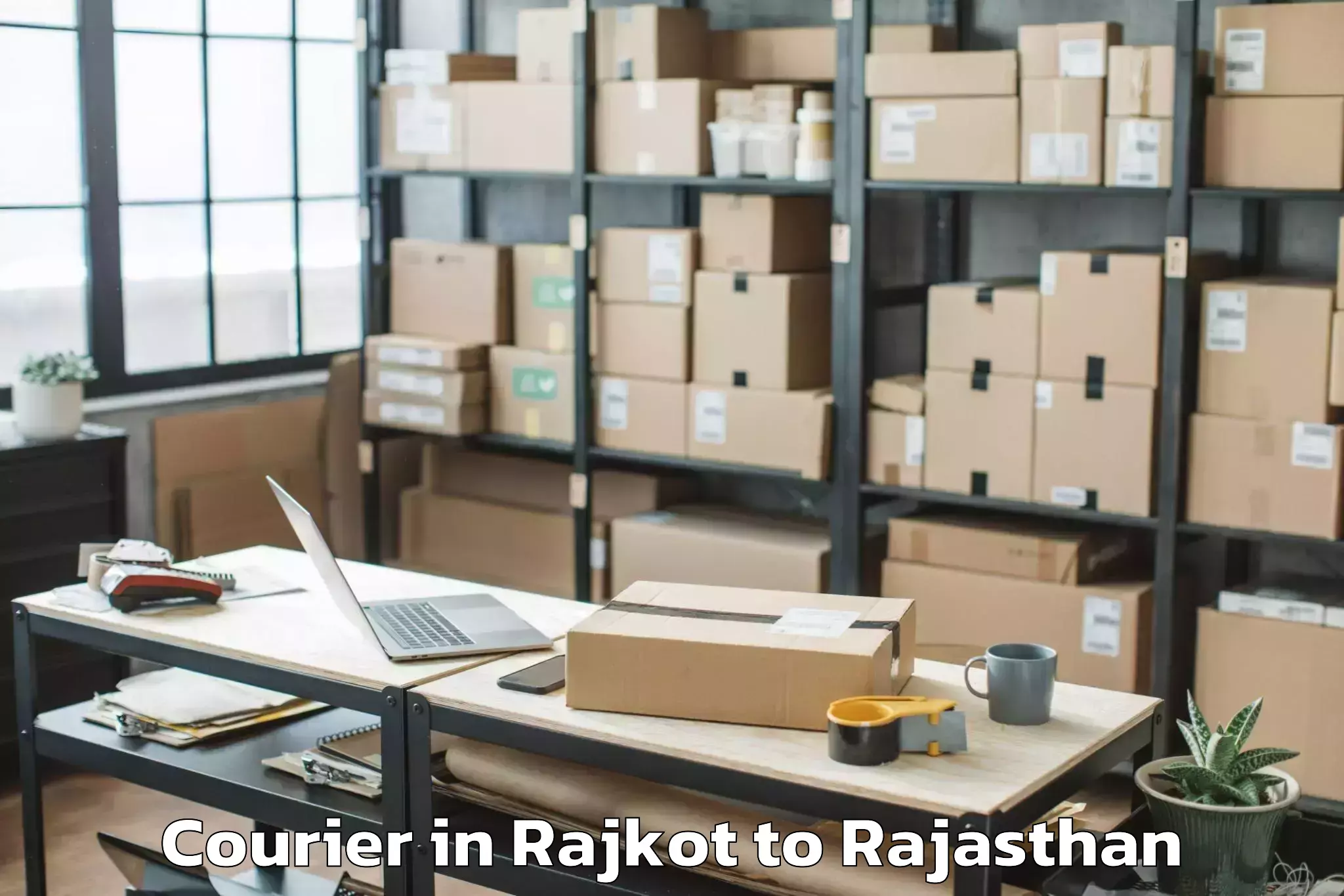 Easy Rajkot to Chauth Ka Barwara Courier Booking